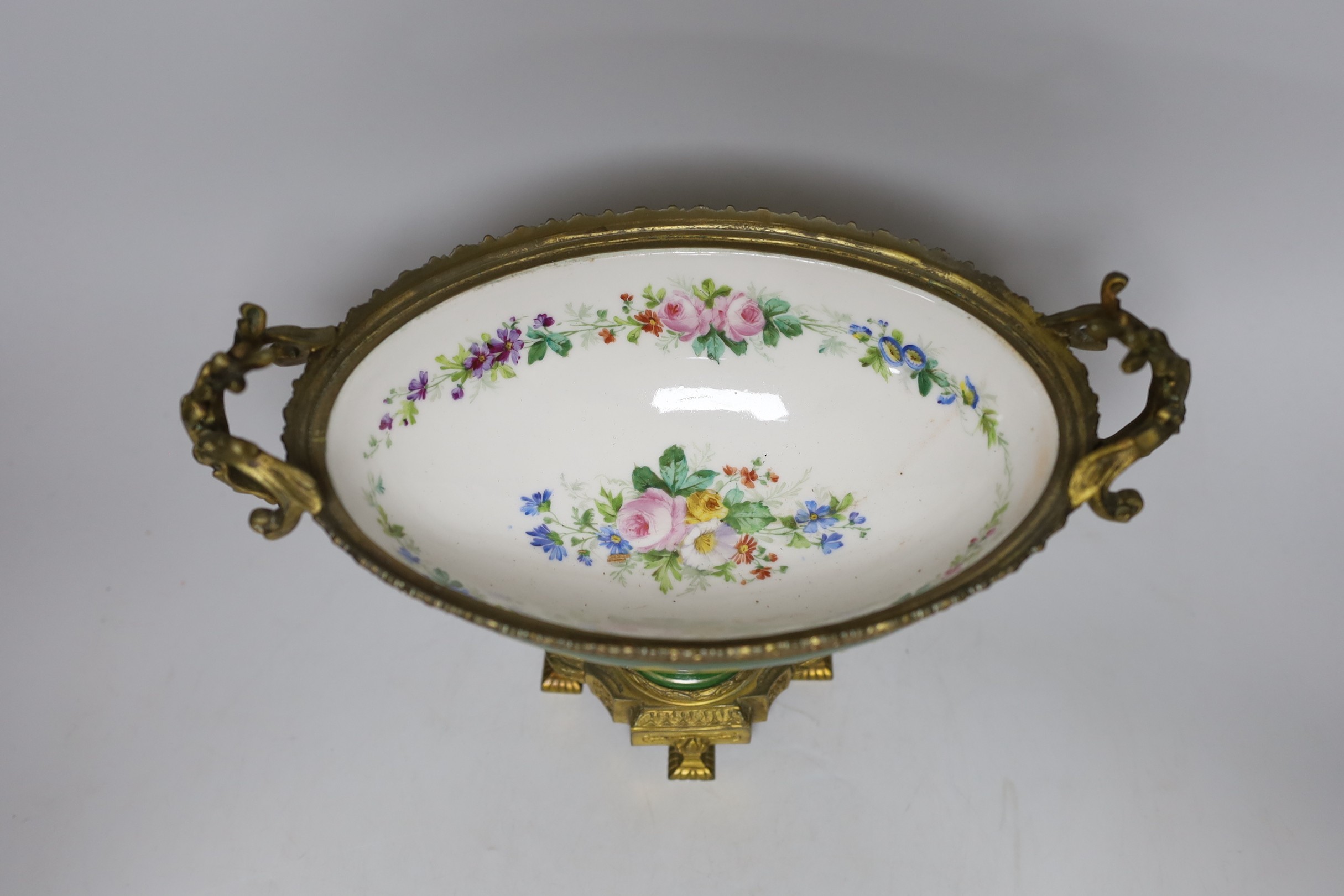 A Sevres-style ormolu mounted centrepiece. 31cm wide